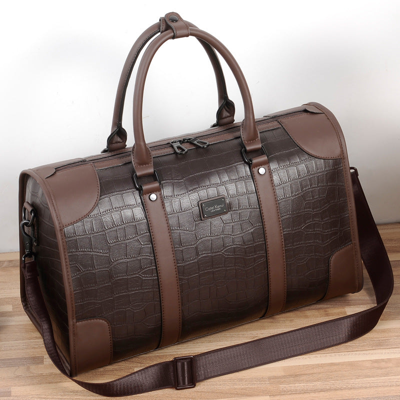 The Élite Crest Compact Duffle